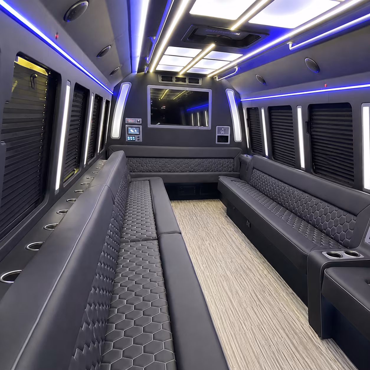 Wedding guests seated inside a party bus serving Houston