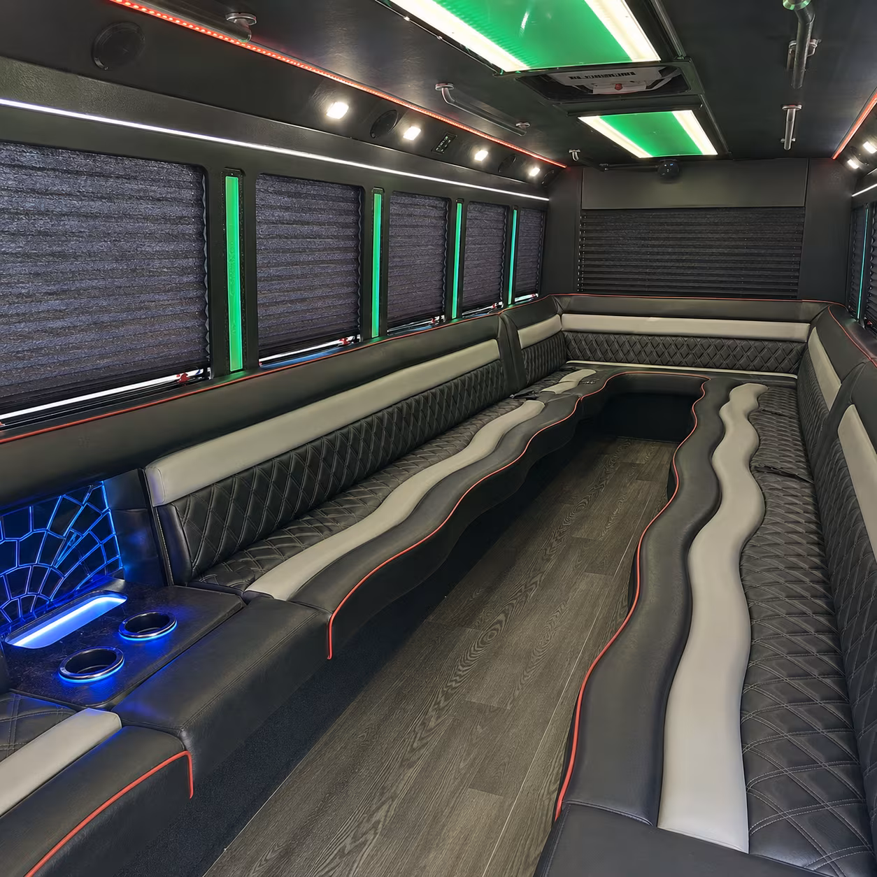 Passenger seating aboard a party bus rental serving Houston